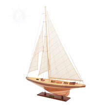 Load image into Gallery viewer, The model is secured tightly on a solid wood base with a brass nameplate. The mast and sails are folded down for easy shipping. It’ll make a perfect gift for home or office decorator, boat enthusiast, or passionate collector.
